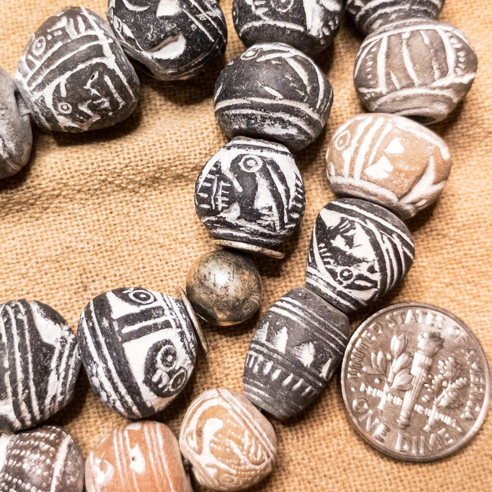 Spindle whorls, Manteno culture, Ecuador