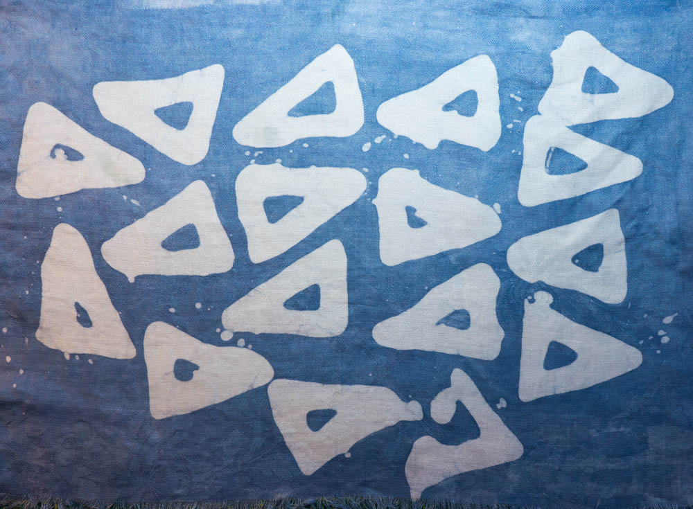 experiment with wax resist batik and indigo dye