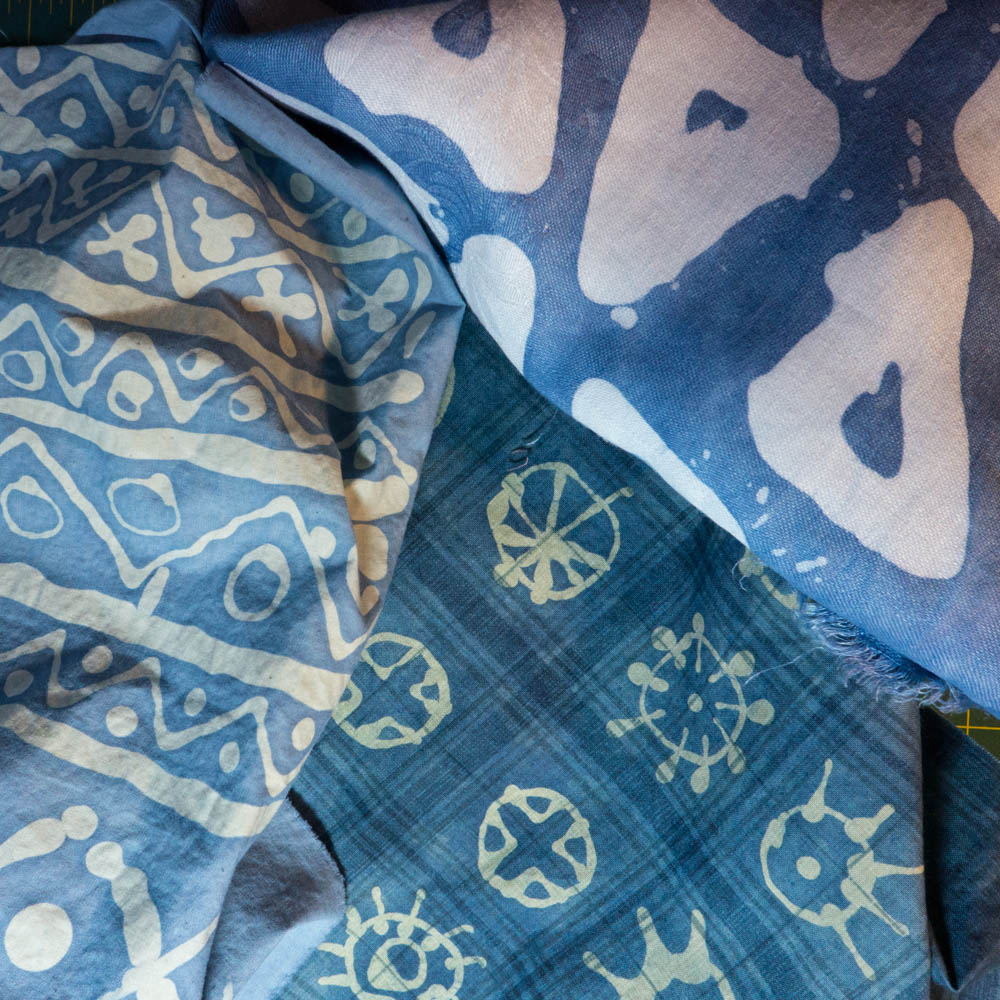 experiment with wax resist batik and indigo dye